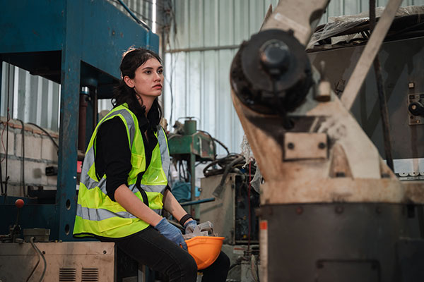 [image] Fatigued factory worker