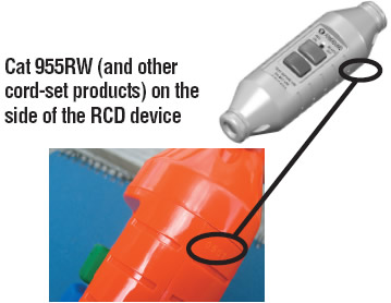 [image] Black circles showing Cat 955RW (and other cord-set products) batch number location on side of the RCD device