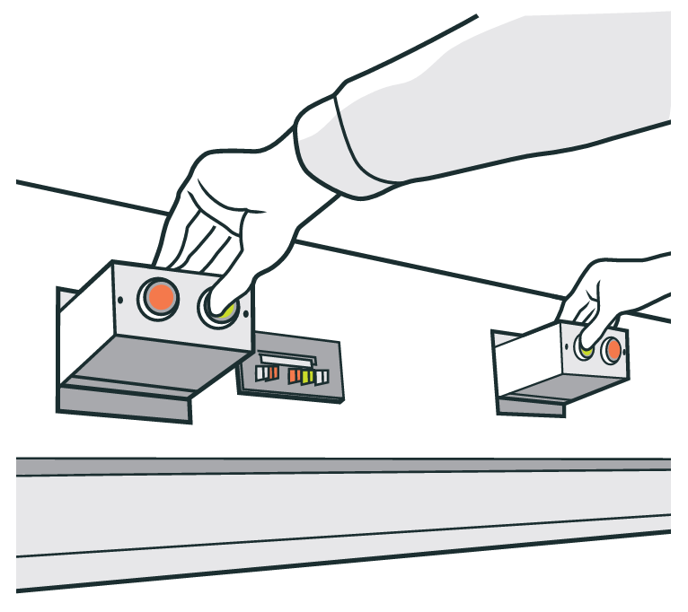 Illustration of a person operating a two-hand control device.