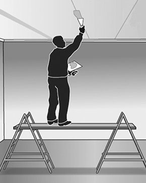 [image] A plasterer stands on a trestle scaffold to plaster a ceiling