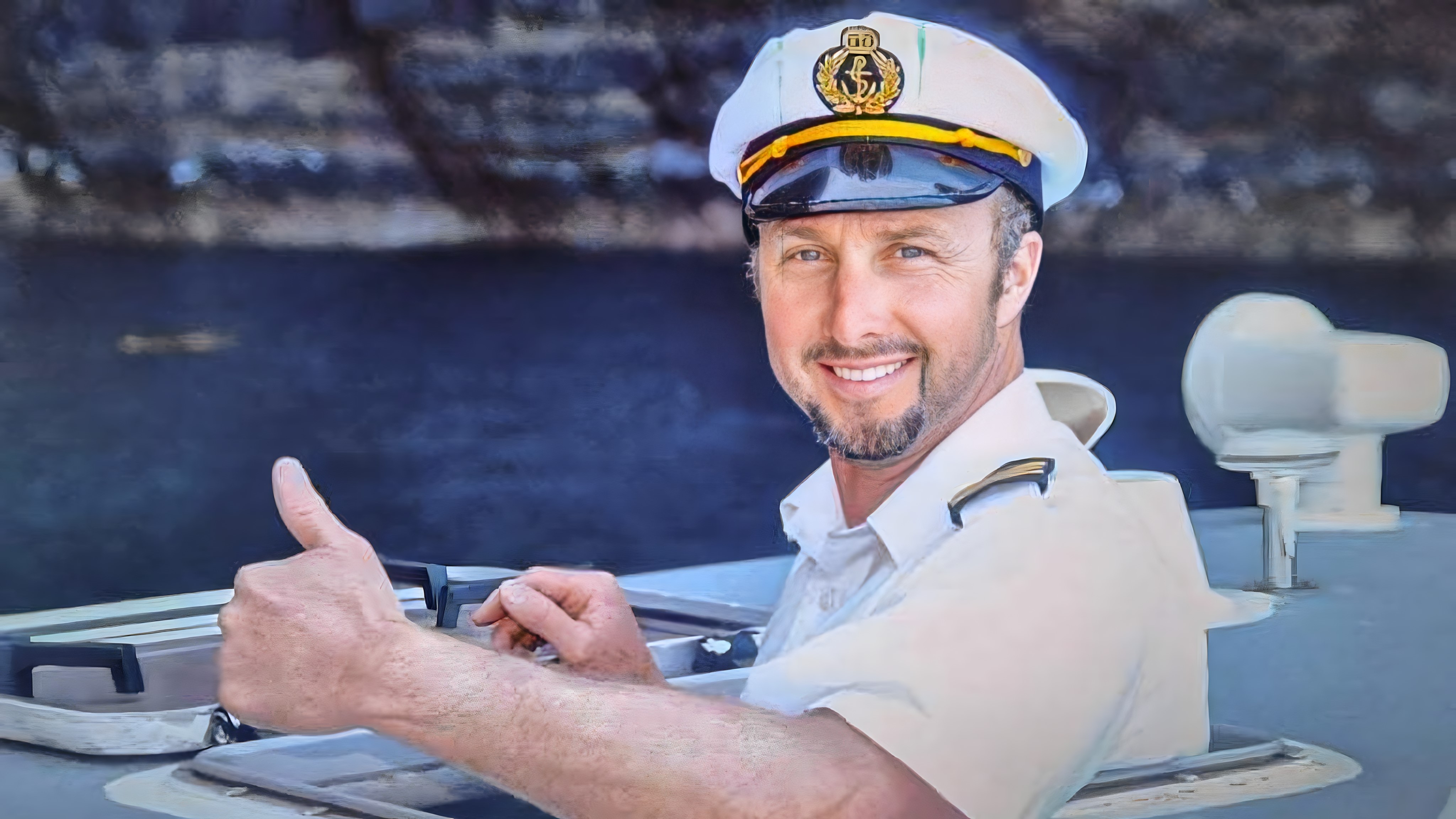 [image] Photo of Julian Yates in uniform on a boat